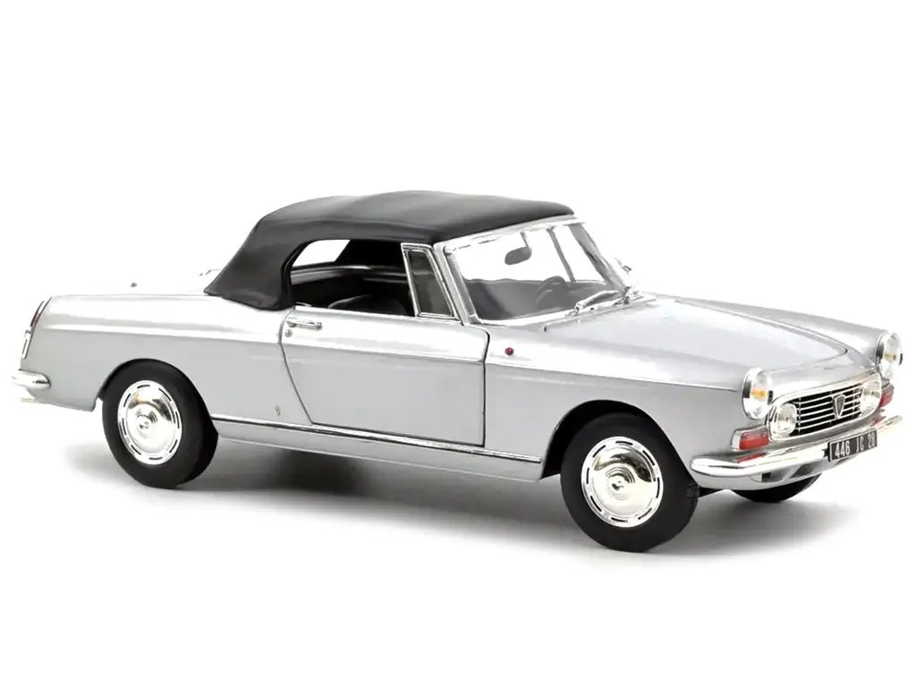 1967 Peugeot 404 Cabriolet Silver Metallic 1/18 Diecast Model by Norev – Collector’s Dream