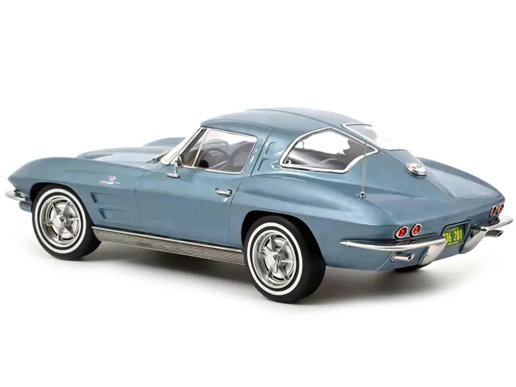 1963 Chevrolet Corvette Stingray Diecast Model 1/18 Light Blue Metallic by Norev 1 1963 Chevrolet Corvette Stingray Diecast Model 1/18 Light Blue Metallic by Norev