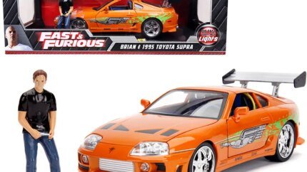 1995 Toyota Supra Orange Metallic with Lights & Brian Figurine - Fast & Furious Collectible