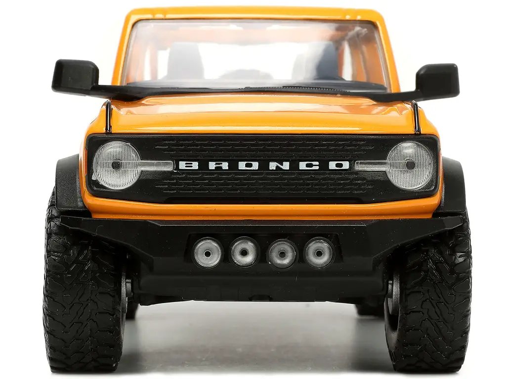 2021 Ford Bronco Orange Metallic Diecast Model 1/24 by Jada – Just Trucks Series with Extra Wheels 3 2021 Ford Bronco Orange Metallic Diecast Model 1/24 by Jada – Just Trucks Series with Extra Wheels - Image 3