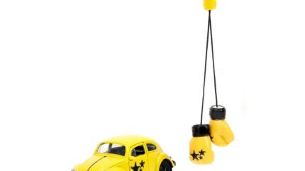 1959 Volkswagen Beetle Diecast Model - Yellow Punch Buggy with Boxing Gloves by Jada 1/32