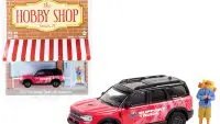 2021 Ford Bronco Sport Pink and Black "Off-Roadeo Adventure Support Truck" with Backpacker Figurine "The Hobby Shop" Series 11 1/64 Diecast Model Car by Greenlight