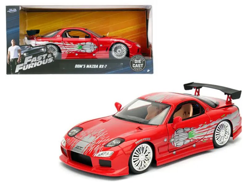 Diecast Model Cars wholesale toys dropshipper drop shipping Dom's Mazda RX-7 Red Fast and Furious Movie 1/24 Jada 98338 drop shipping wholesale drop ship drop shipper dropship dropshipping toys dropshipper diecast drop shipper dropshippers. Dom's Iconic Red Mazda RX-7 with Graphics - Fast & Furious Collectible
