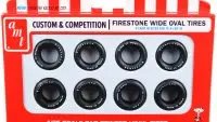 Enhance Your 1/25 Scale Models with AMT's Skill 2 Firestone Wide Oval Tires Set - 8 Pieces