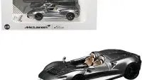 McLaren Elva Convertible Dark Gray Metallic 1/64 Diecast Model Car with Extra Wheels by CM Models