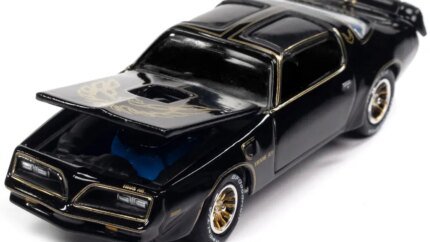 1977 Pontiac Trans Am Black with Gold Eagle 1/64 Diecast Model by Johnny Lightning - 2022 Trivial Pursuit Pop Culture Edition