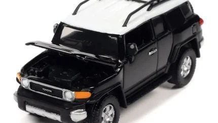 Limited Edition 2007 Toyota FJ Cruiser Diecast Model - Black Diamond & White Top by Johnny Lightning
