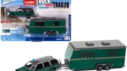 Limited Edition 1997 Chevrolet Tahoe SWAT Diecast Model with Camper Trailer by Johnny Lightning - 1/64 Scale